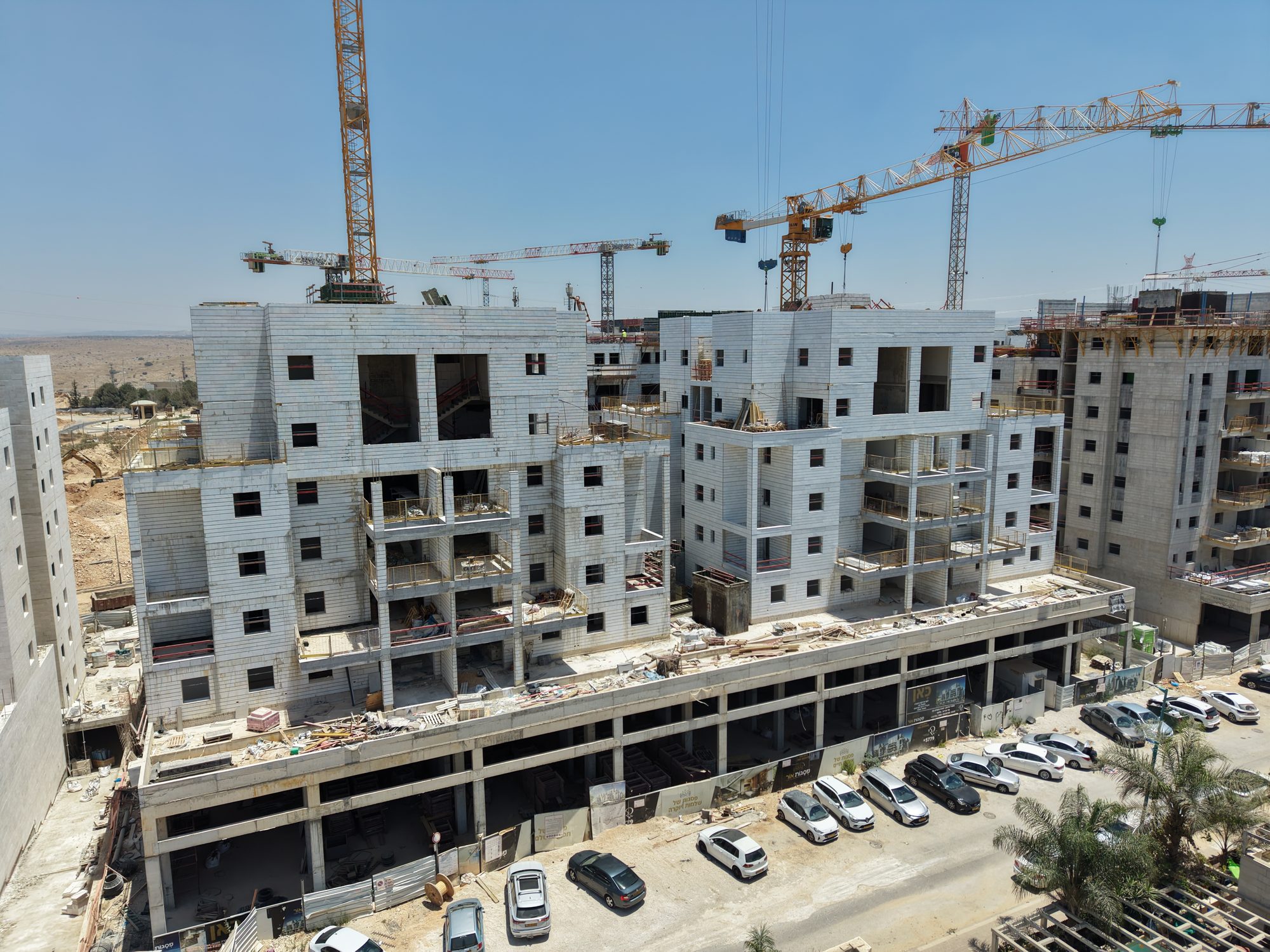 Elad — drone photo facing east, July 2026